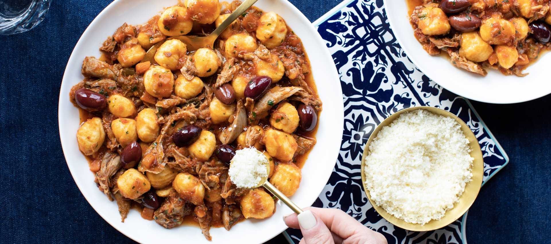 Duck ragu with tomato and black olives