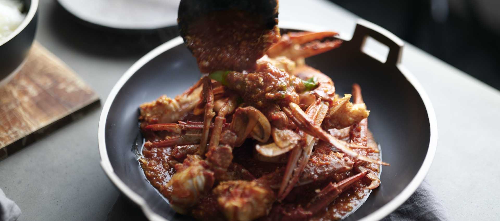 Singapore chilli crab with chopped tomatoes