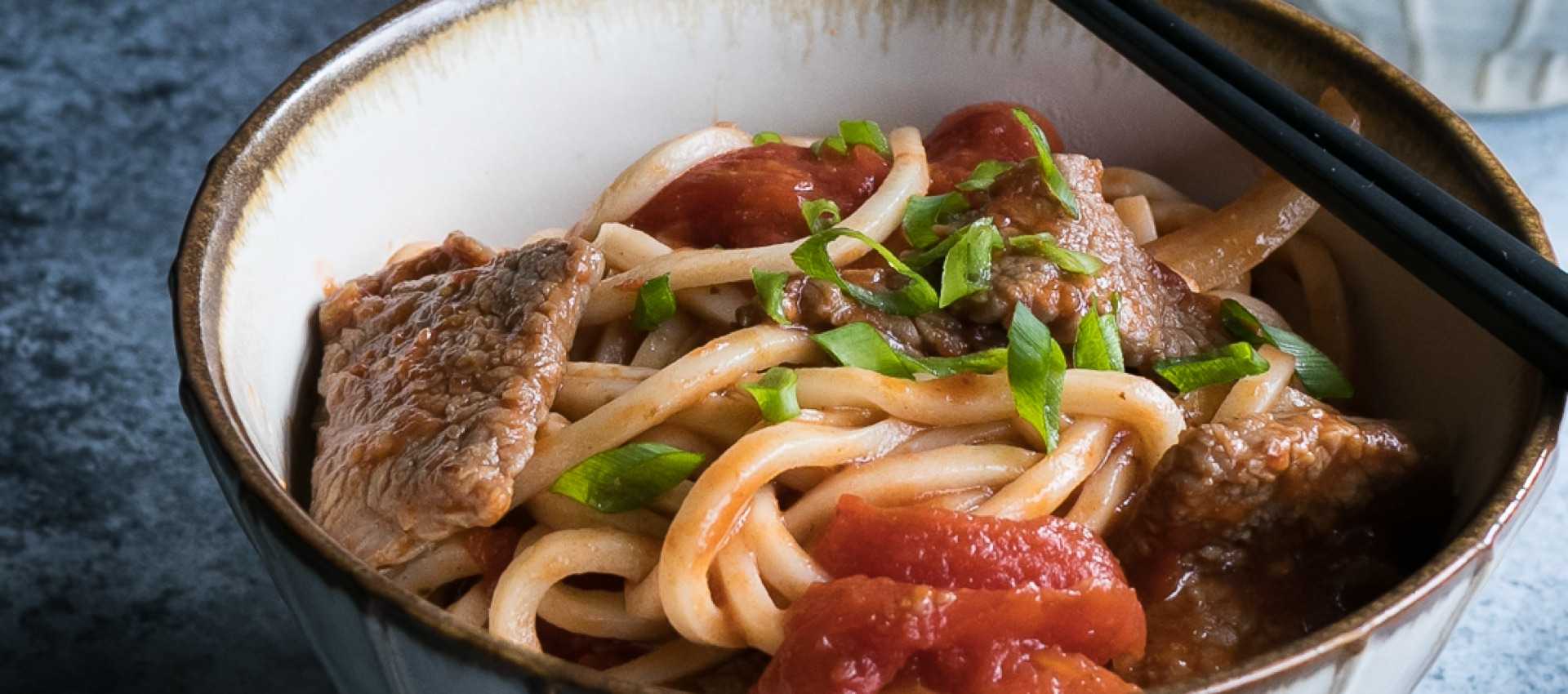 Tomato and beef stir fry with noodles