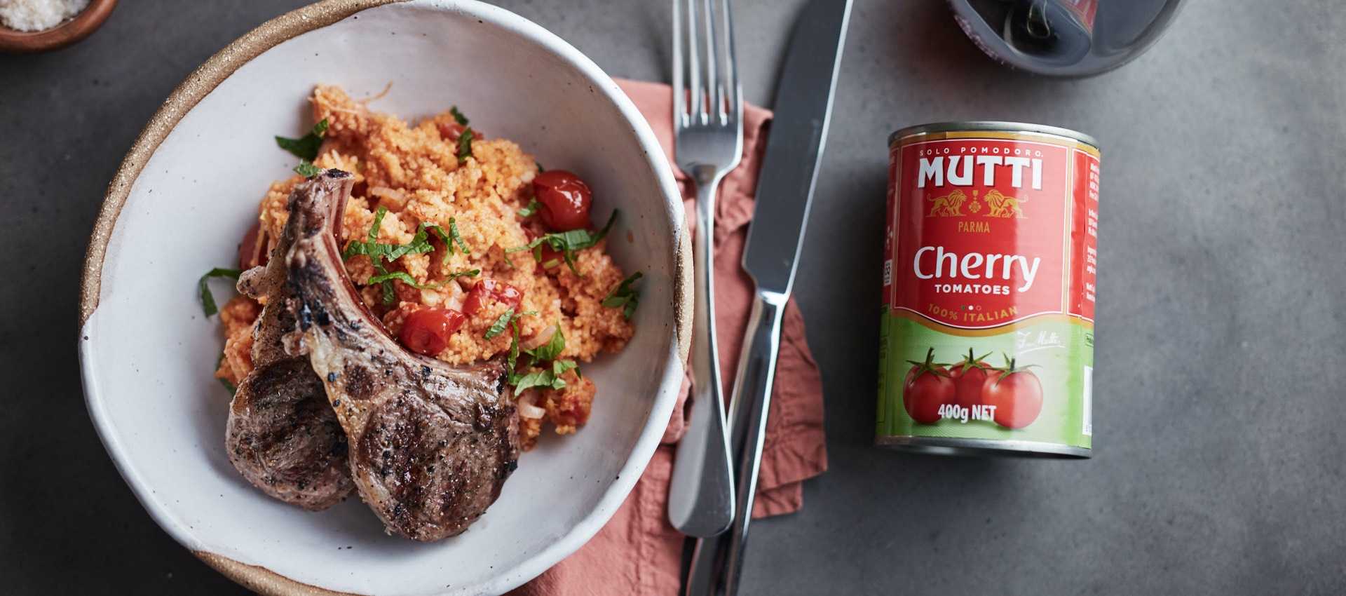 Lamb chops and couscous with tomato