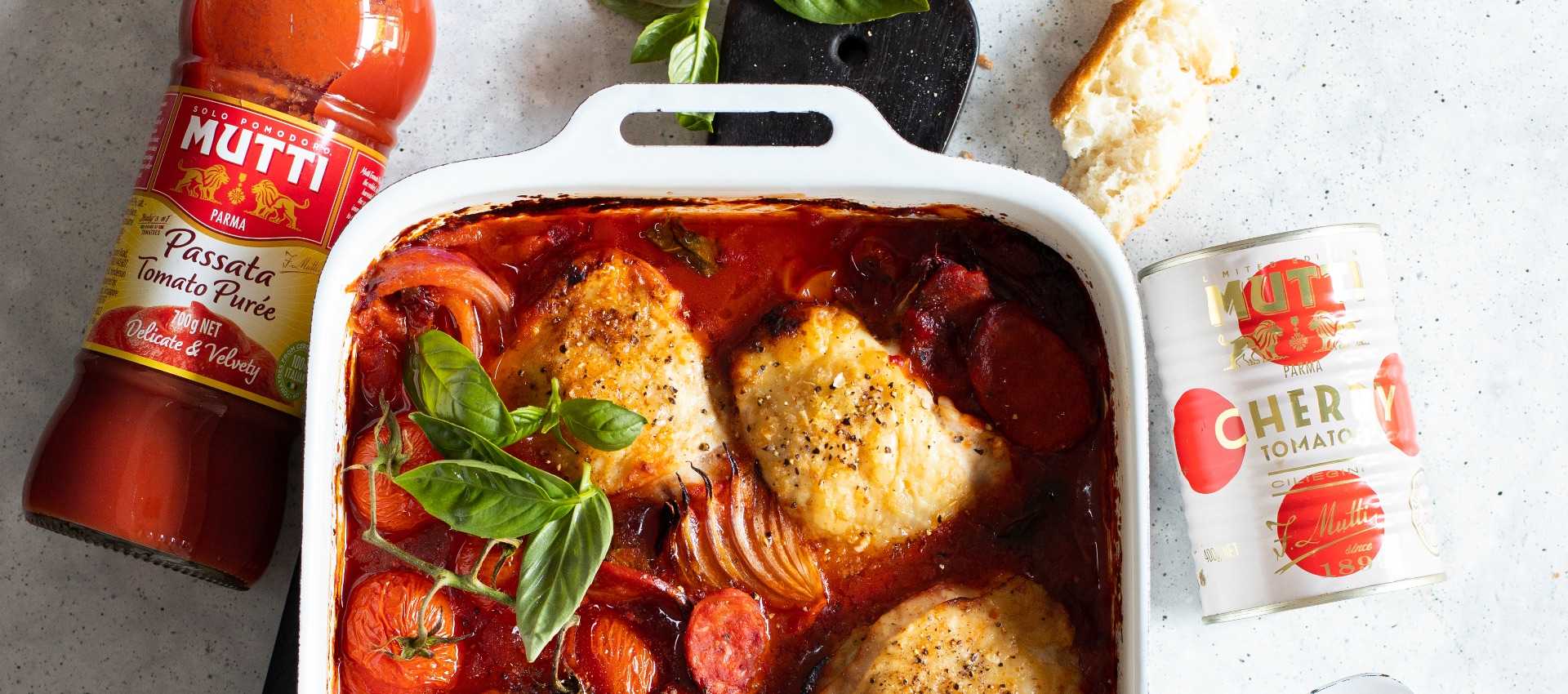 Crispy pan chicken thigh, tomato and chorizo bake