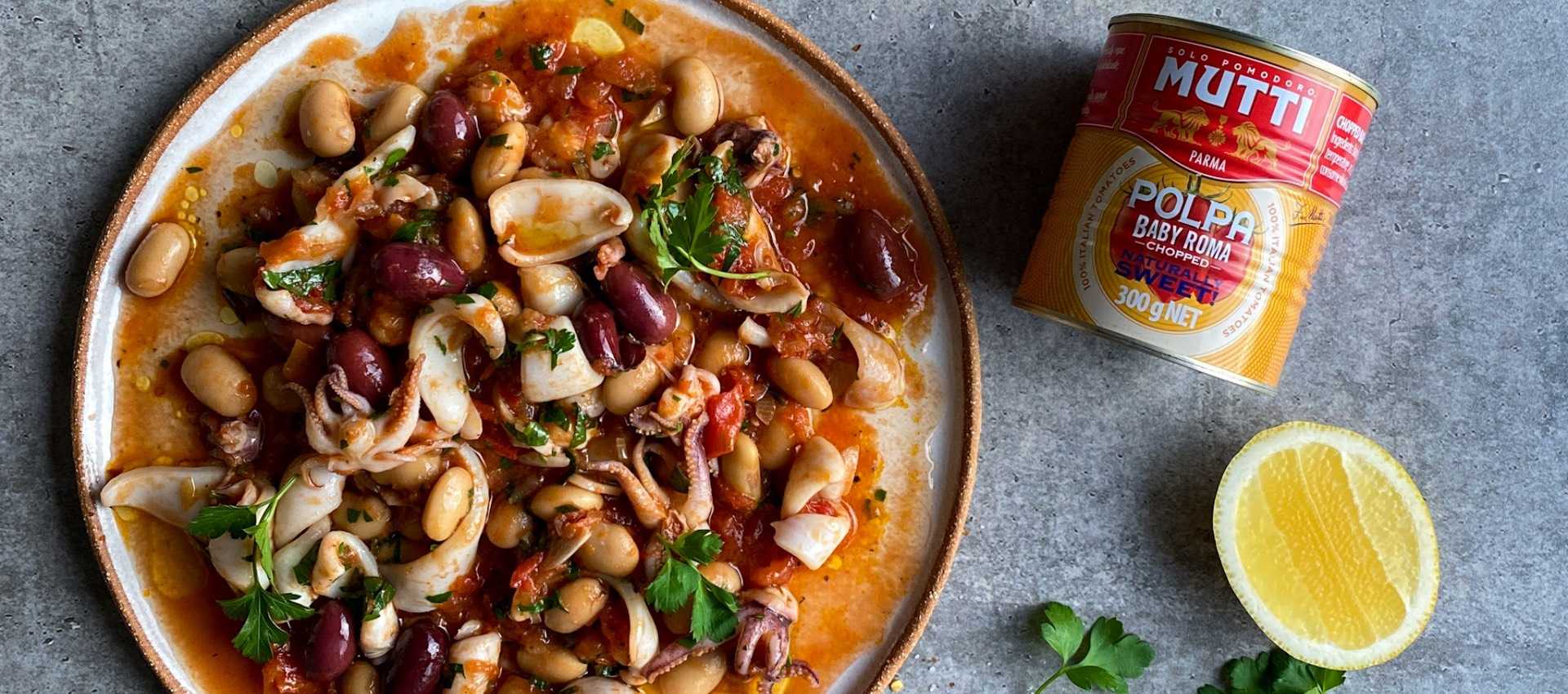Braised squid with baby Roma tomatoes
