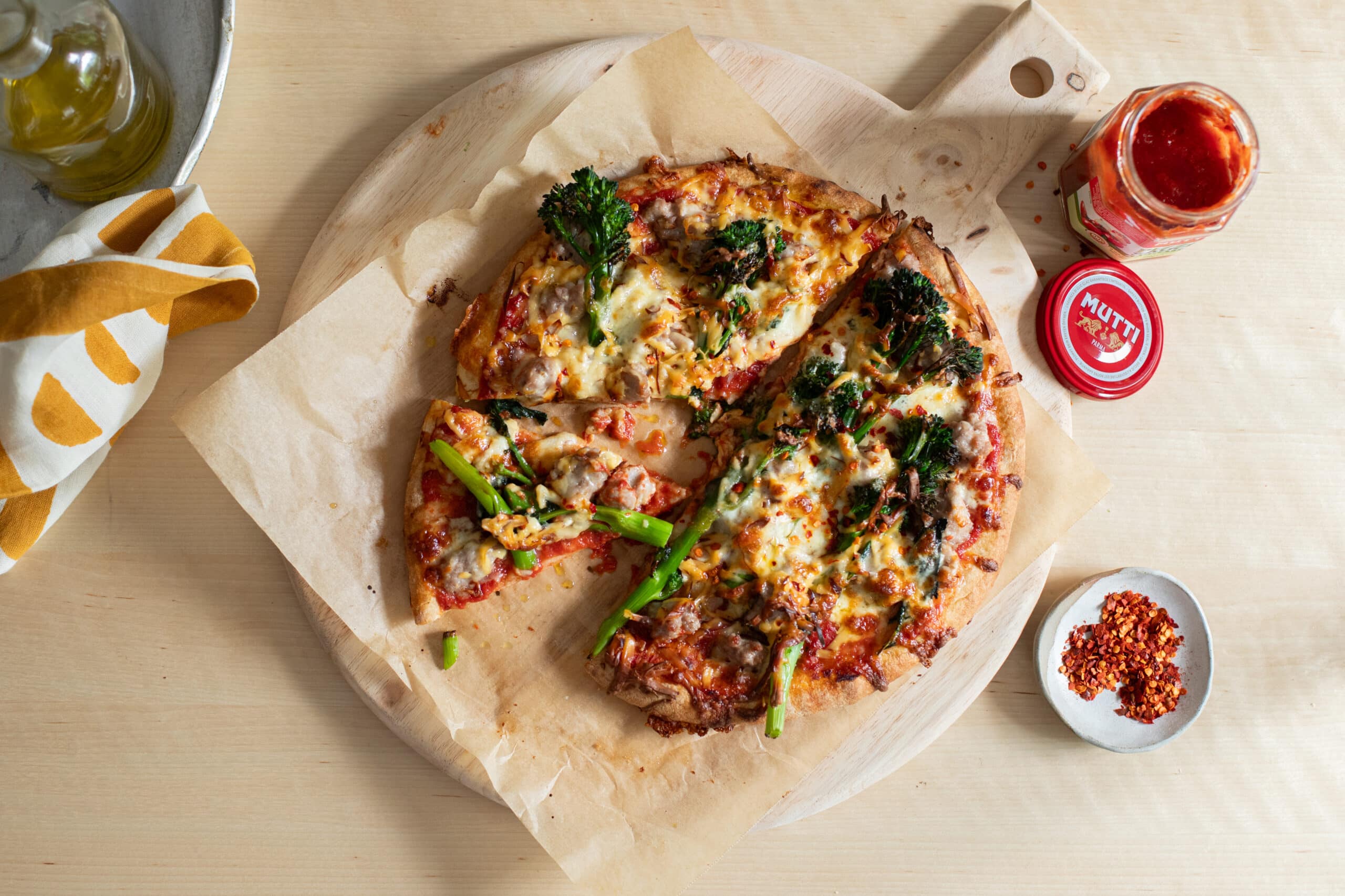 Pork sausage and broccolini pizza with smoked mozzarella