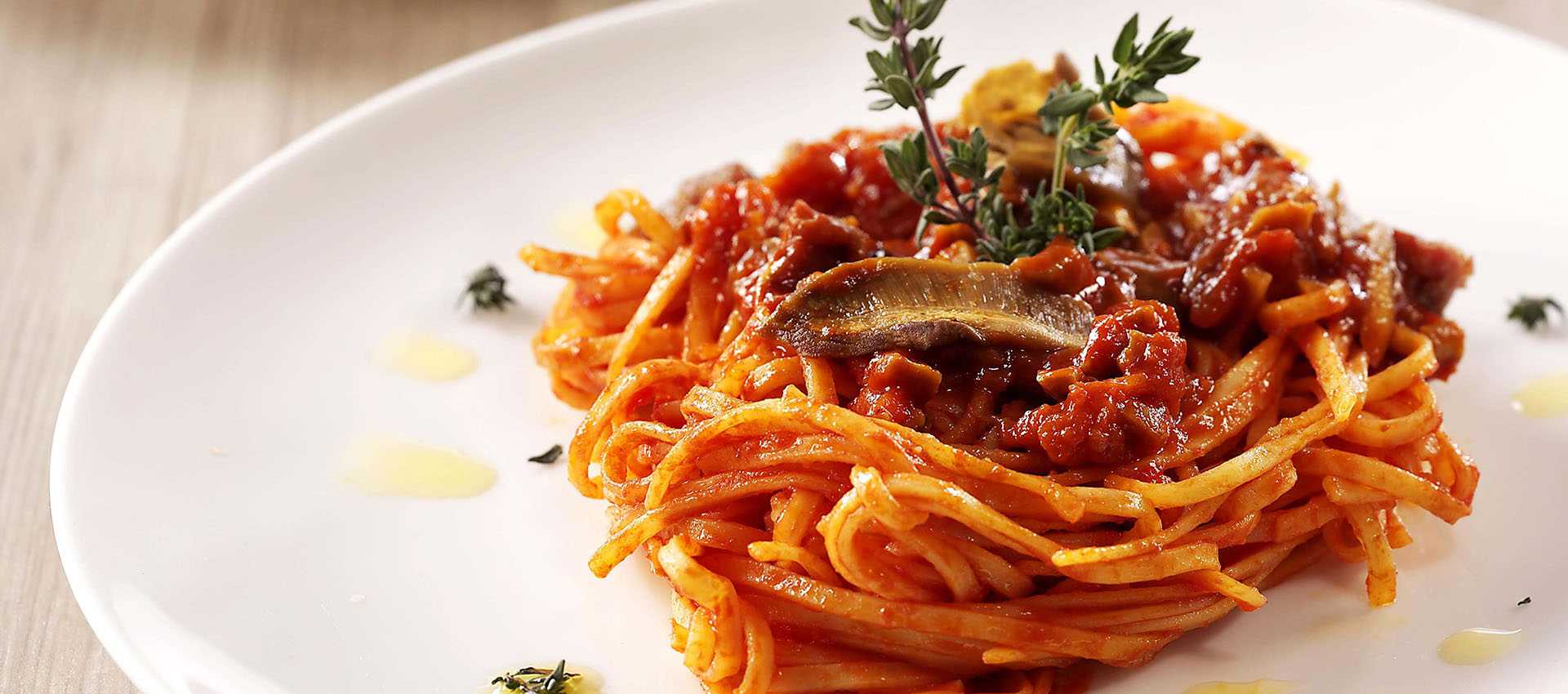 Tagliolini with Porcini Ragu made with Tomato Paste
