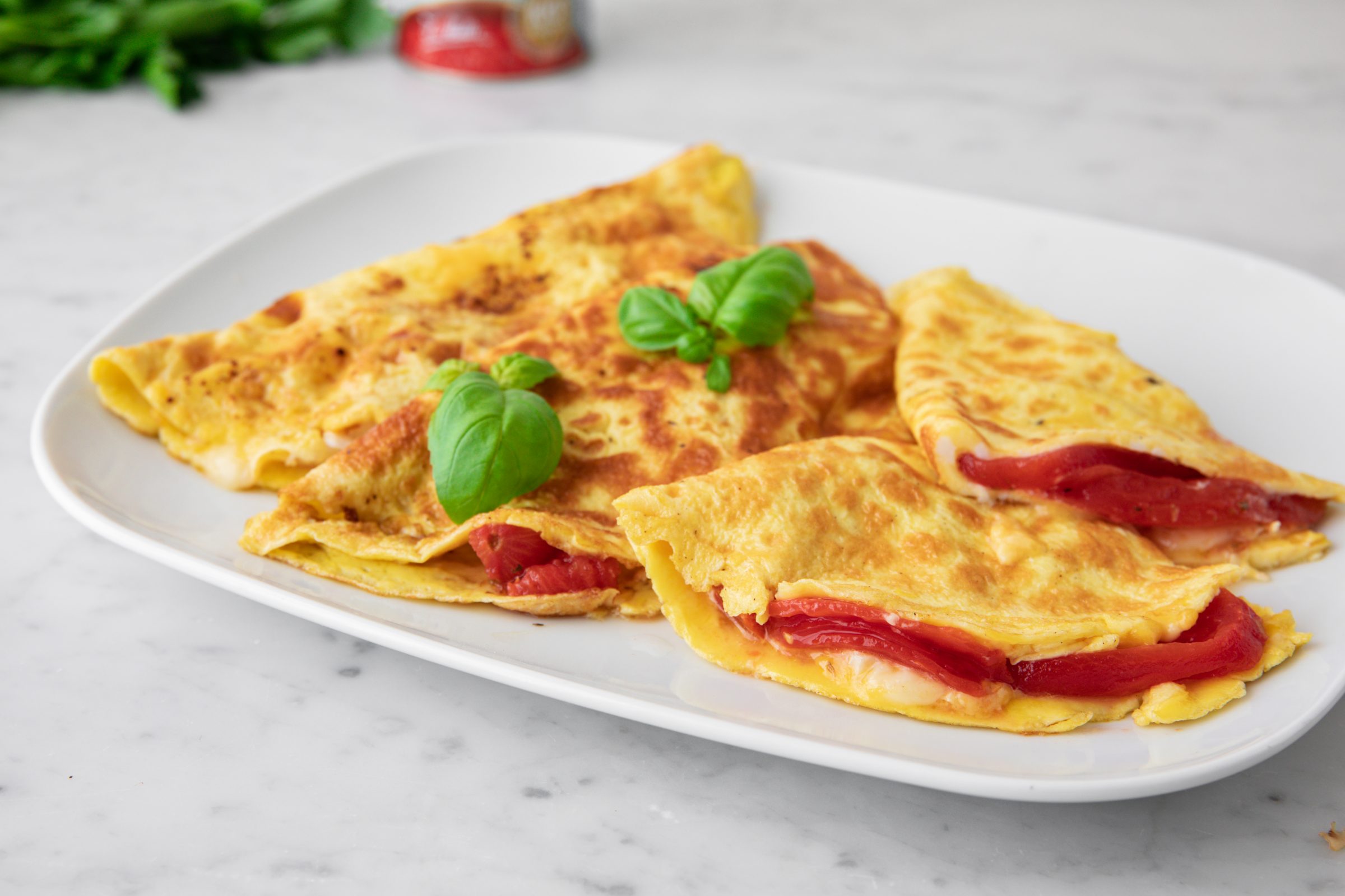 Omelet with Brie and Marinated Tomatoes