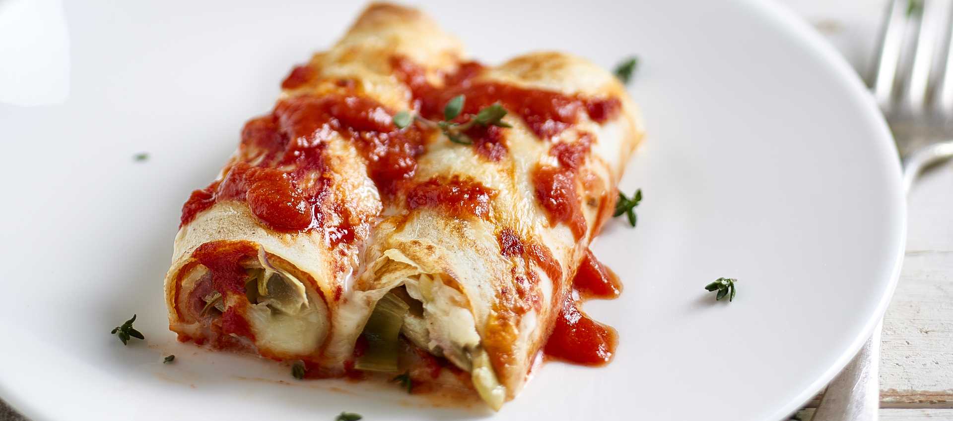 Cannelloni di crepes con carciofi e prosciutto