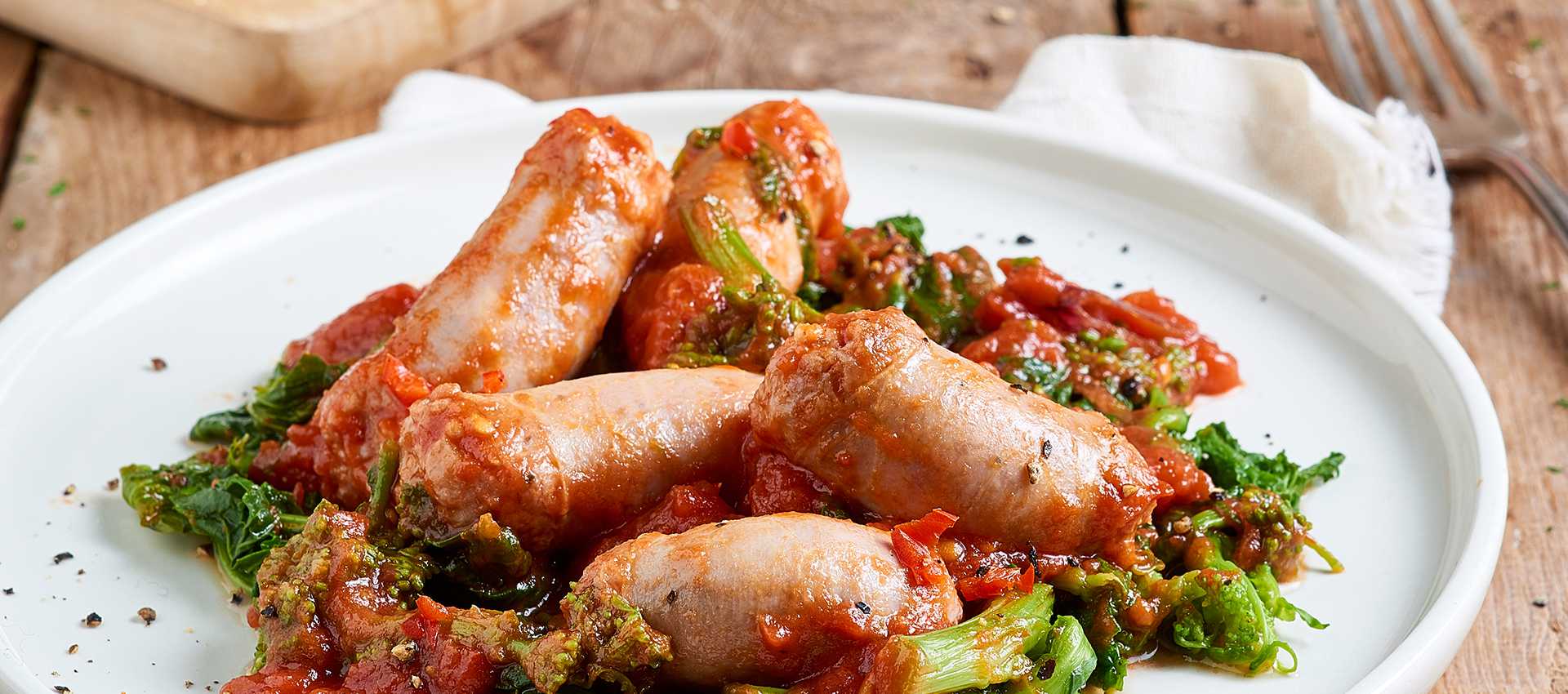 Salsiccia al pomodoro e cime di rapa