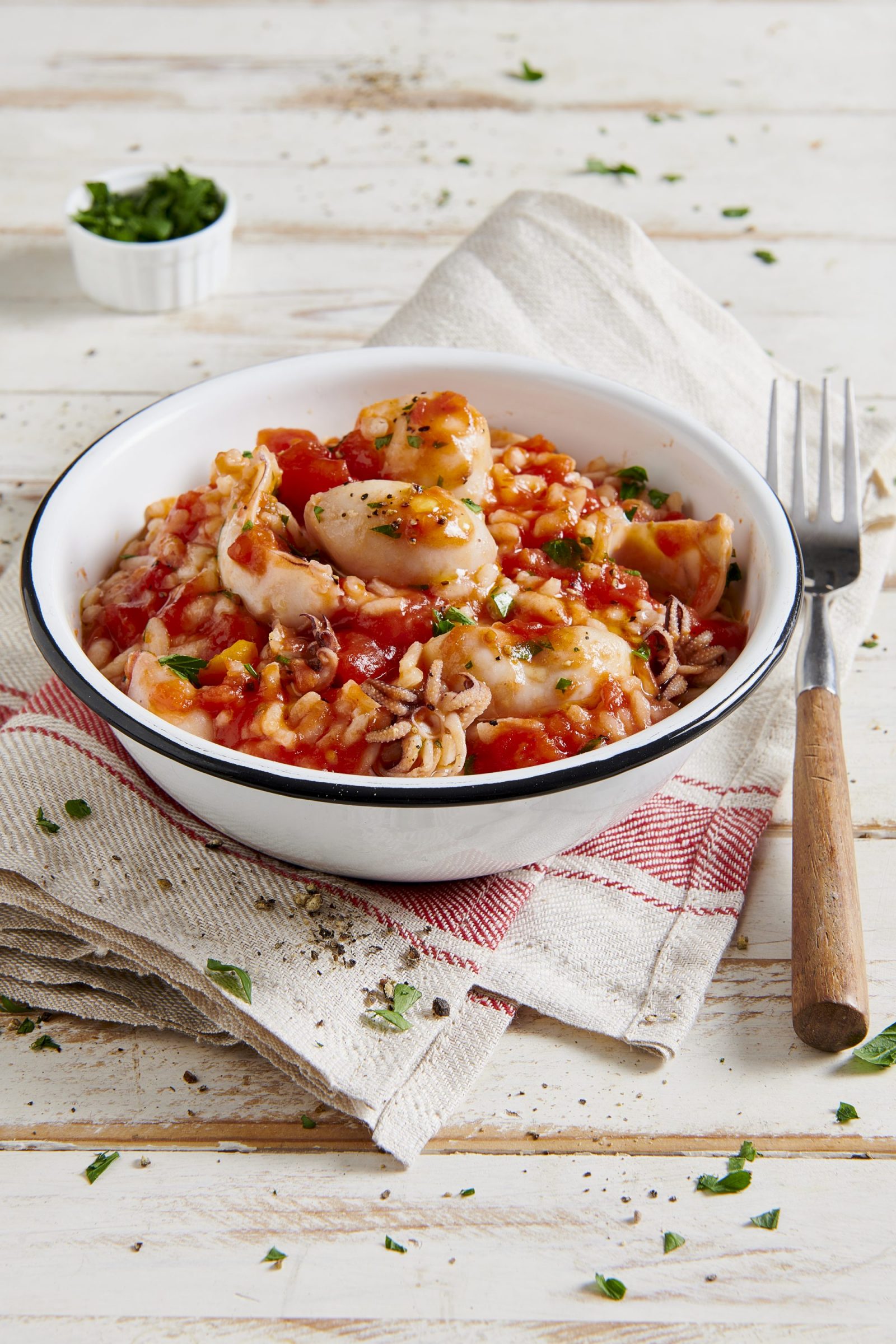 Risotto con seppioline e pomodoro