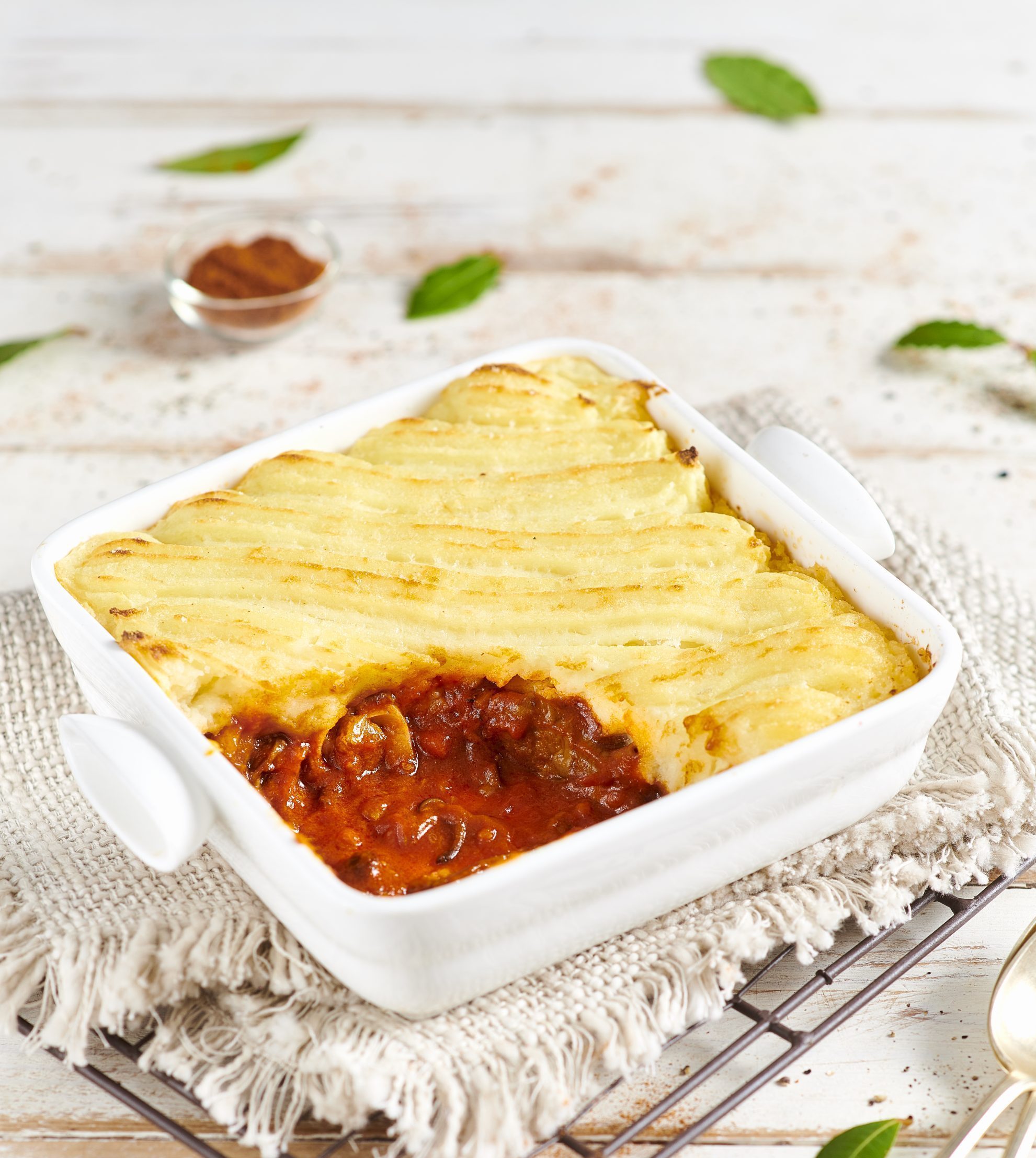 Gratin di patate bocconcini di manzo e funghi