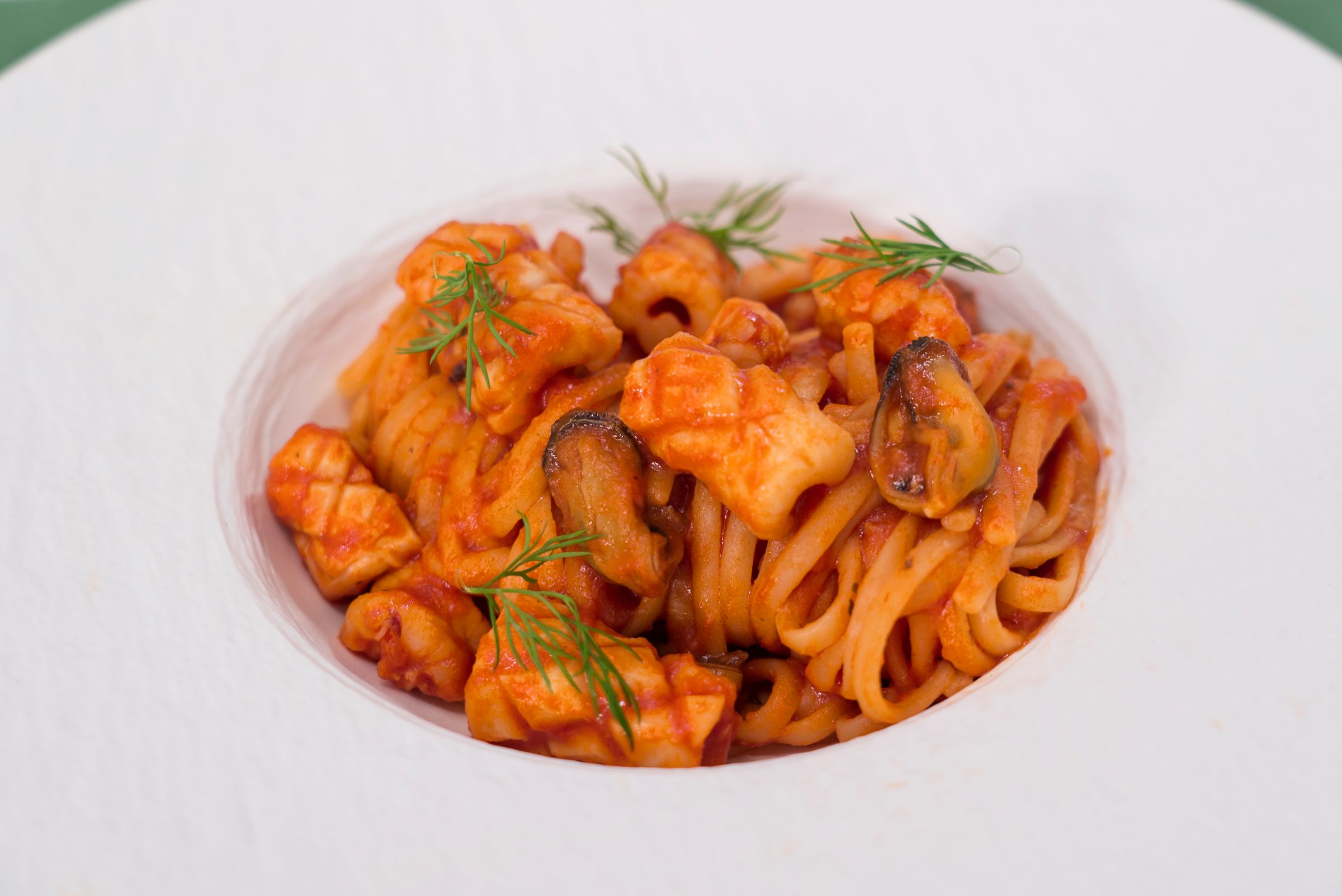 Ragù alla pescatora con salsa pronta ciliegini