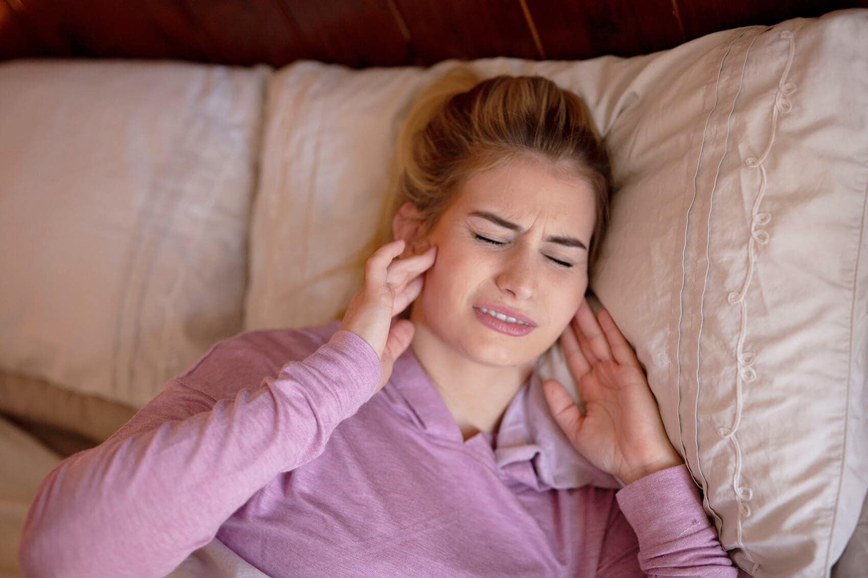 TMJ treatment session with a physiotherapist assisting a patient