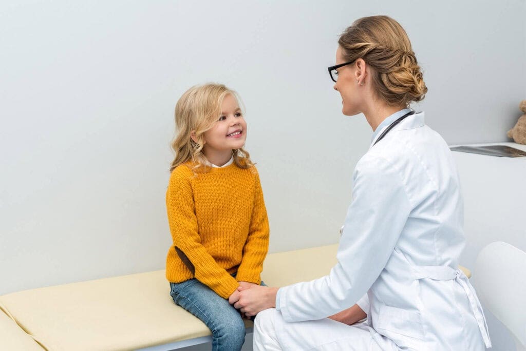 Young girl seeing doctor
