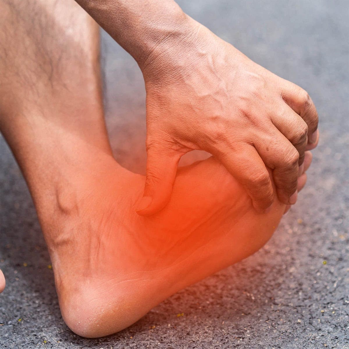 Chiropractor treating plantar fasciitis in Burlington clinic setting