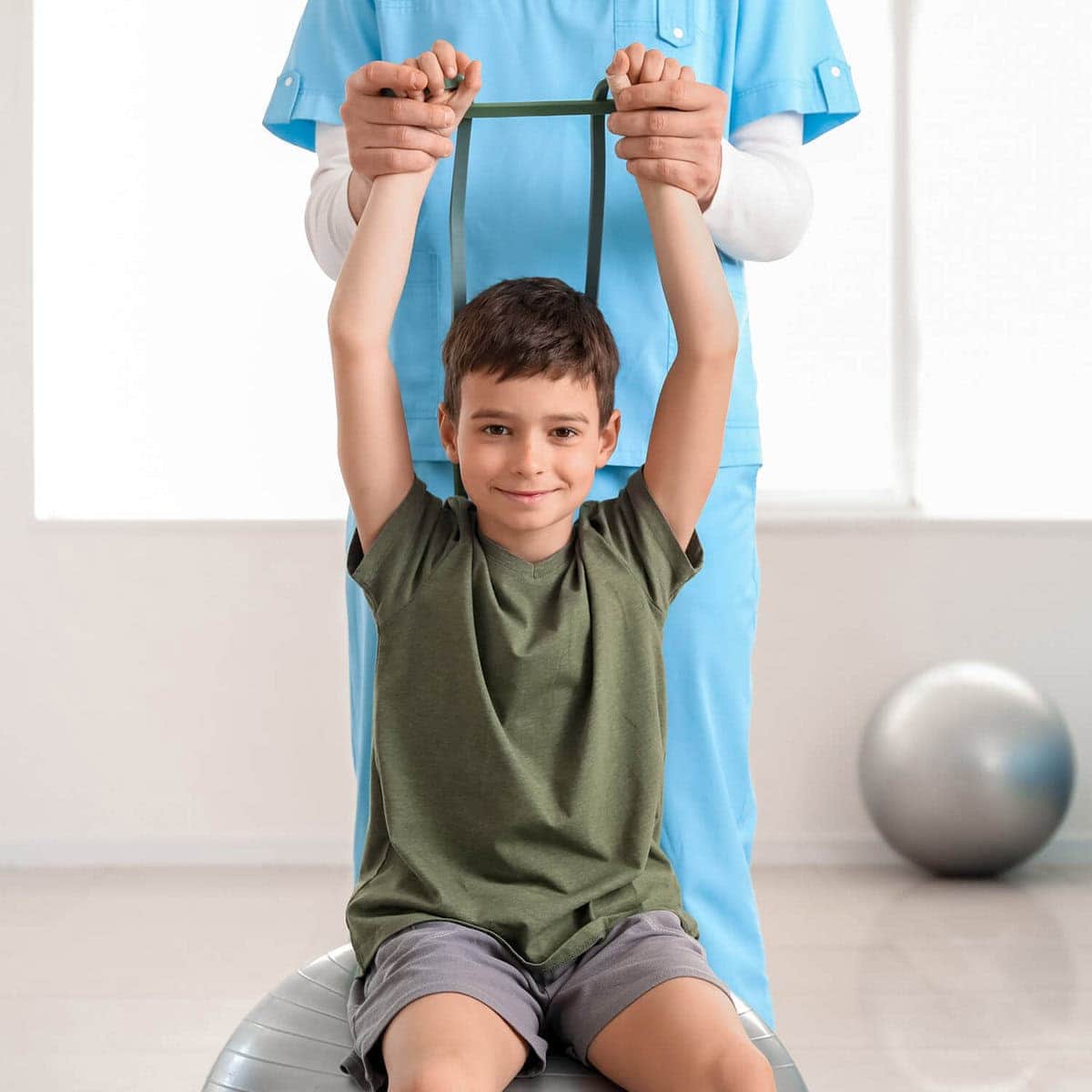Child receiving pediatric chiropractic therapy in a clinic setting