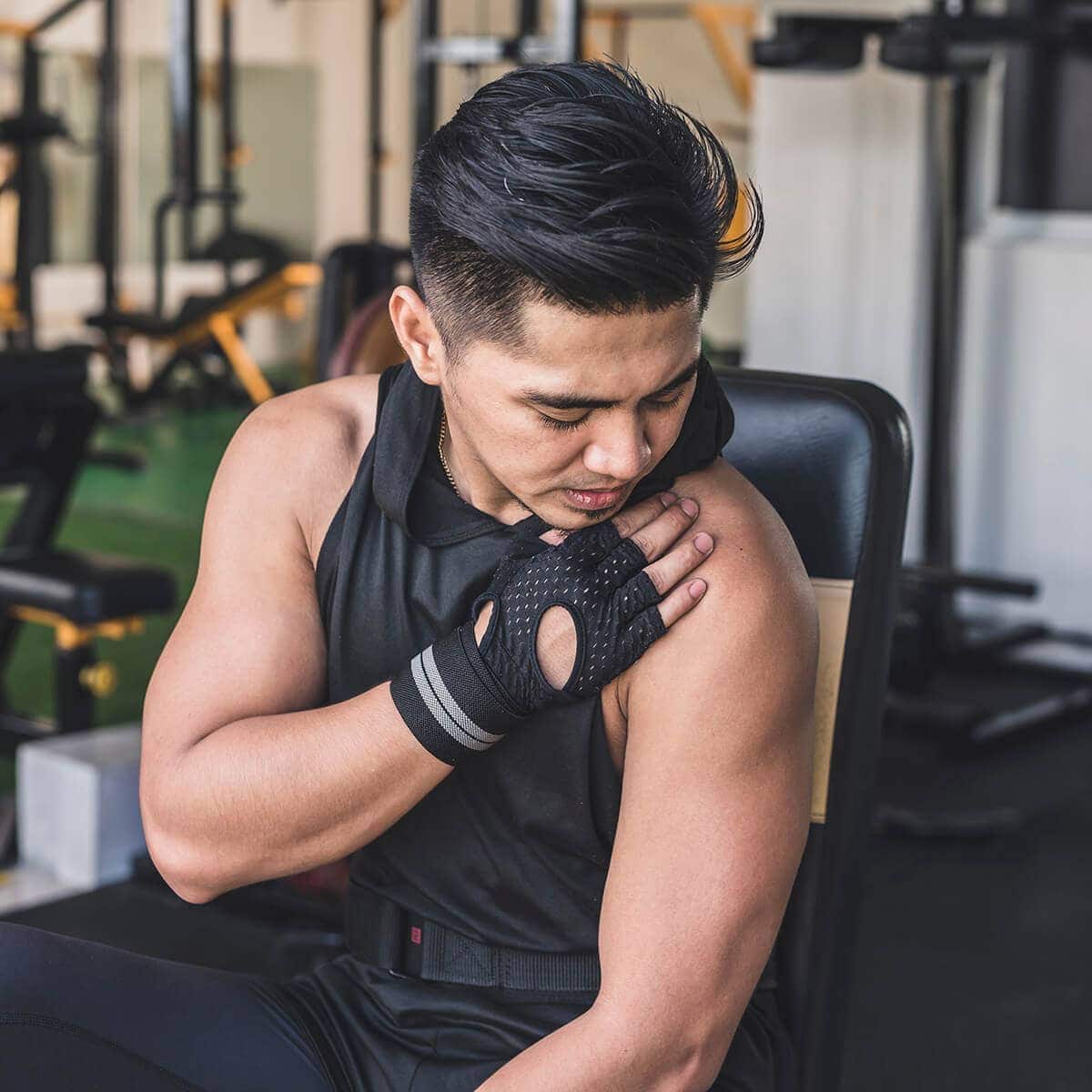 Person performing rotator cuff injury exercises with guidance