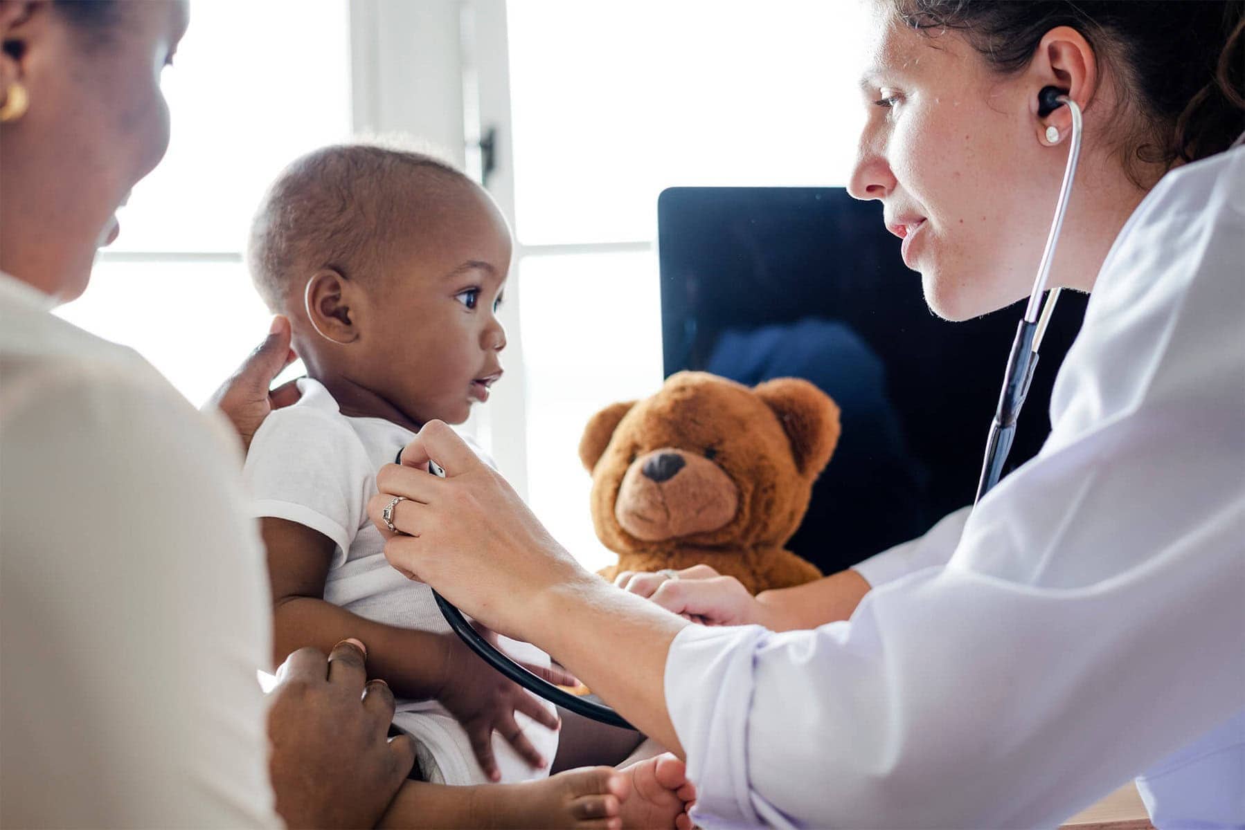 Baby and doctor pediatric services