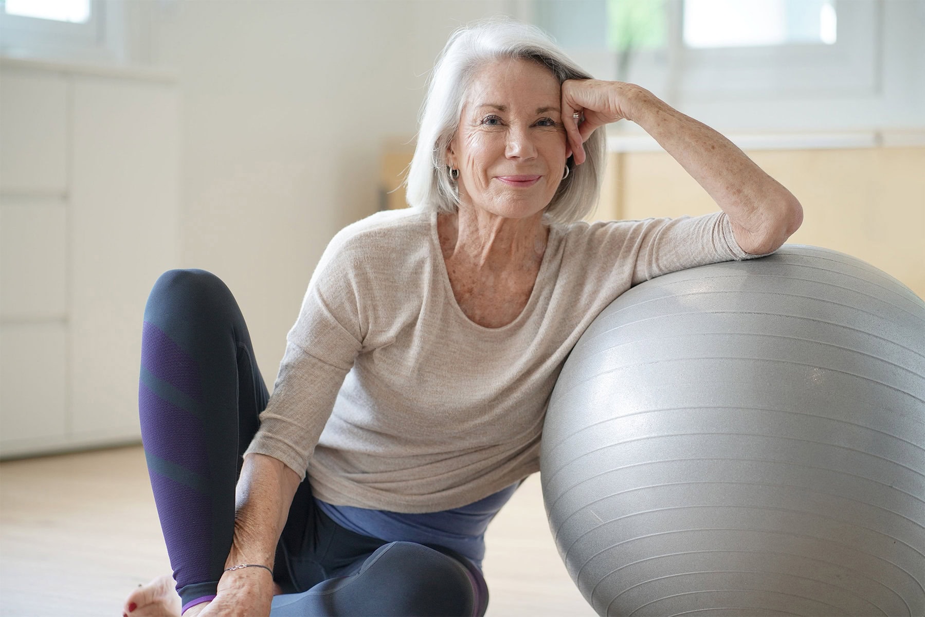 Older woman with exercise ball
