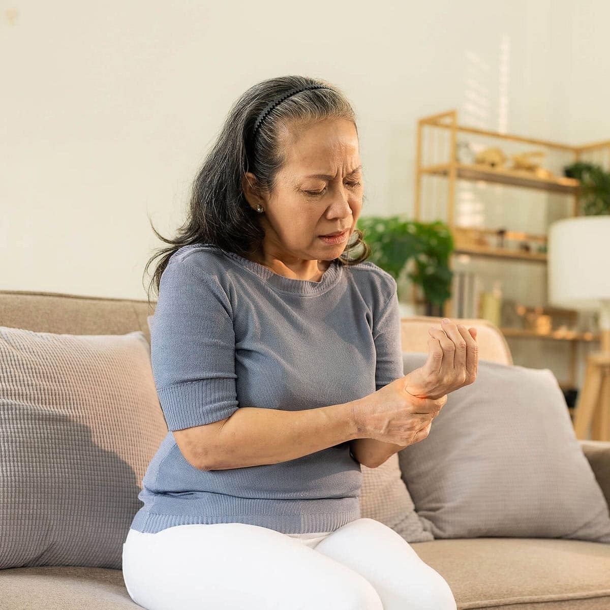 Acupuncturist treating neuropathic pain in Burlington clinic setting