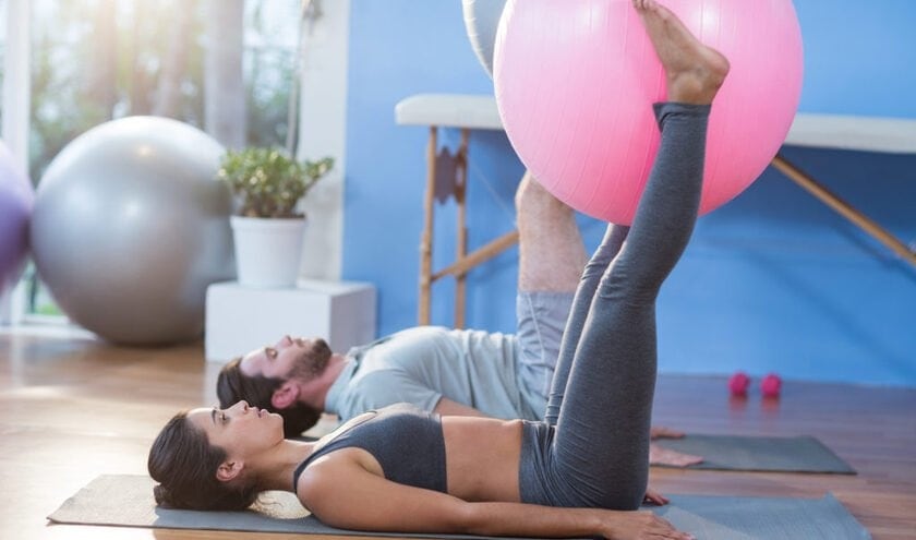 Pelvic floor physiotherapy exercises demonstration with therapist and patient