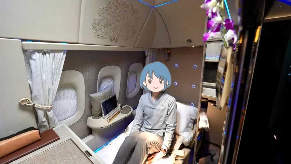 エミレーツ航空B777-300ER新型ファーストクラス搭乗記・肘掛けのリクライニングボタンエミレーツ航空B 777-300ER新型ファーストクラス搭乗記・パジャマを着用