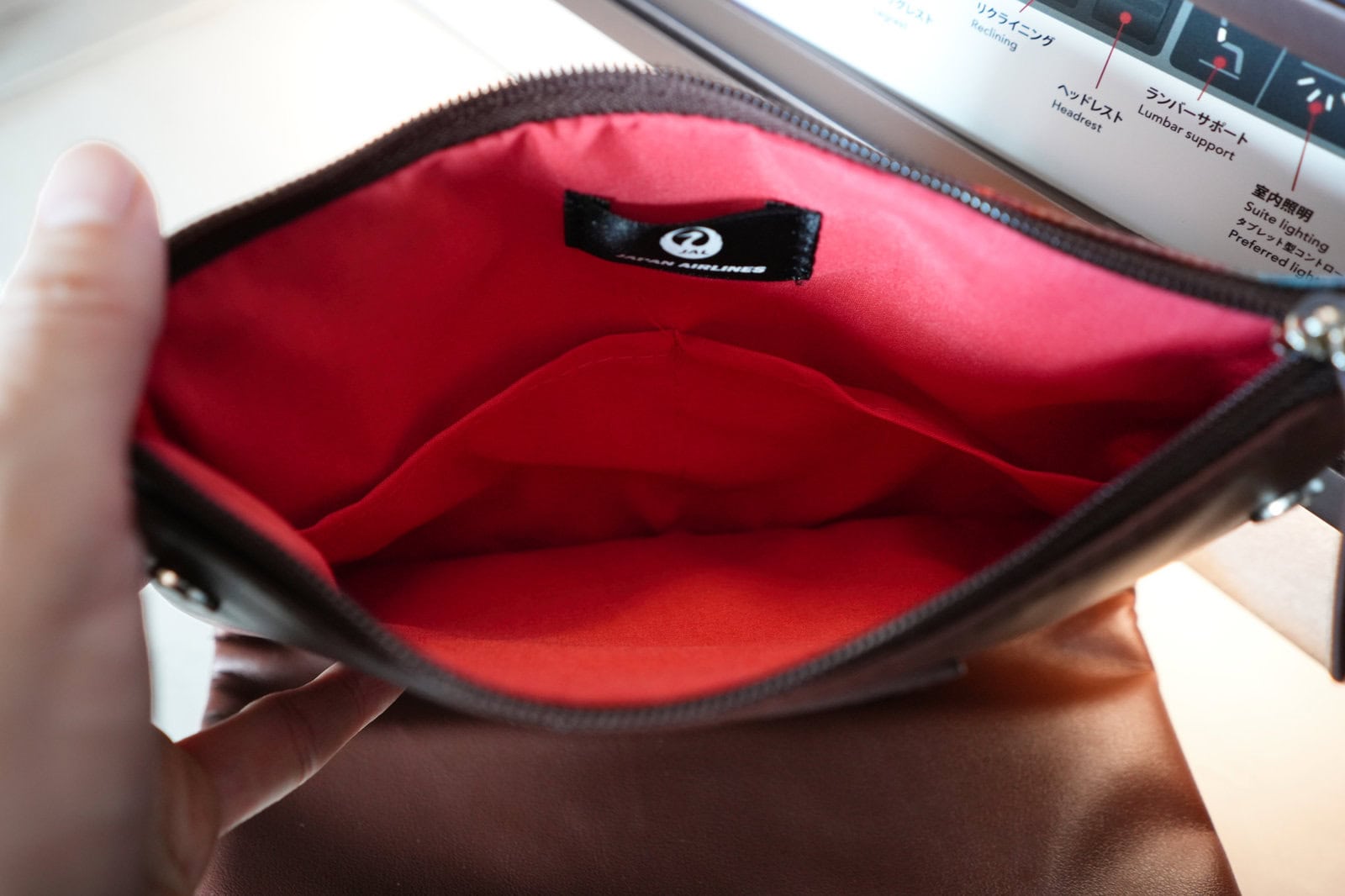 Inside the JAL First Class HERALBONY amenity pouch