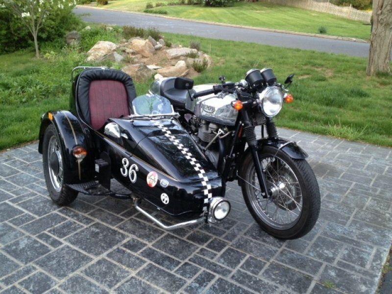 A very different approach, a TAB Slippery Sam tank and TAB seat on a Triumph Thrux but this time with a period sidecar.