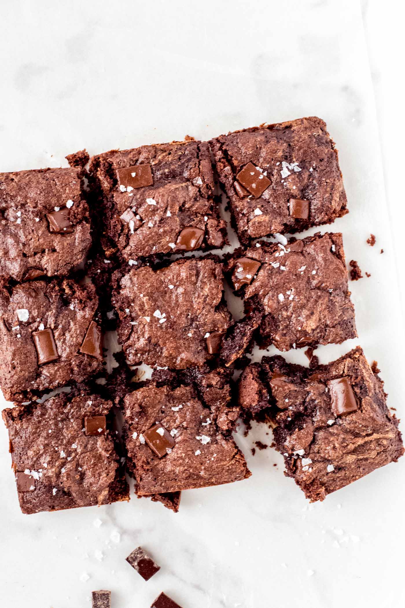 Paleo Brownies lined up in rows on white background