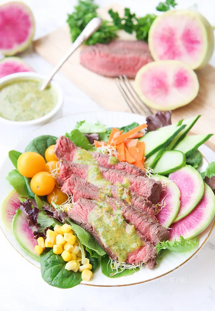 a closeup shot of a full plate of Chimichurri Steak Salad Whole30, Paleo