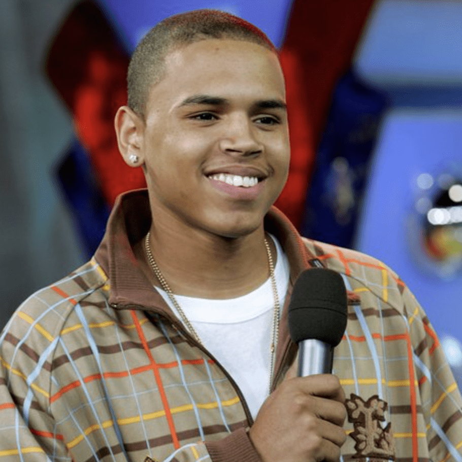 teenage chris brown with microphone in hand