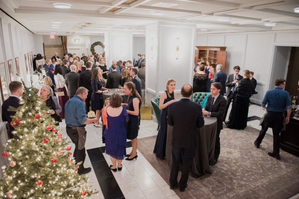 A Christmas wedding cocktail hour in the Line Hotel DC Banneker Ballroom Foyer.