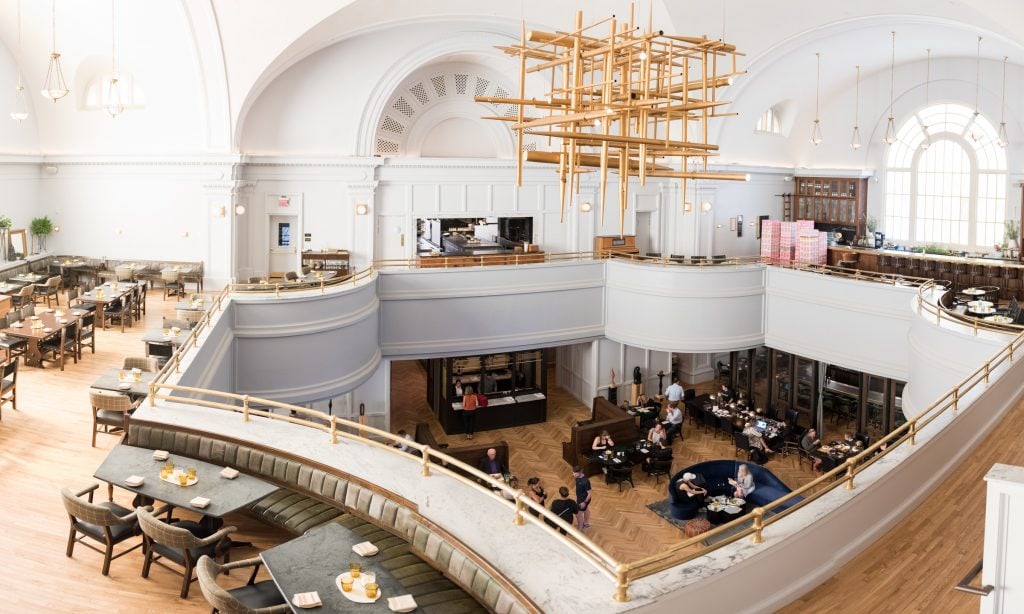 A view of Brothers and Sisters, the main lobby, and the pipe organ chandelier in the Line Hotel DC.