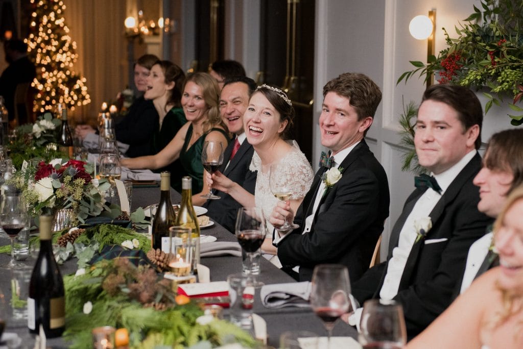 A Line Hotel DC Banneker wedding reception with the bride and groom laughing.