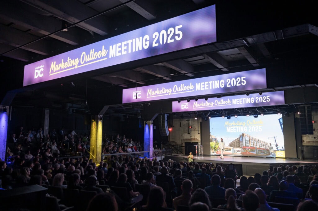 Large audience watching a speaker on stage in Washington DC