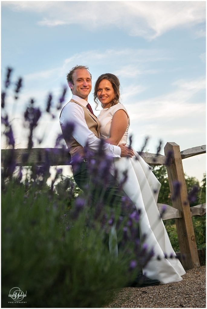 golden hour wedding photograph with bride and groom at millbridge court