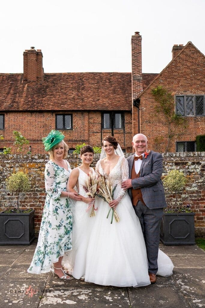 Same sex couple with parents at Lillibrooke Manor