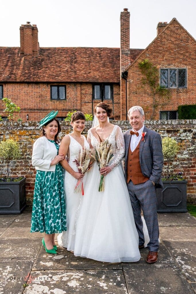 Same sex couple with parents at Lillibrooke Manor