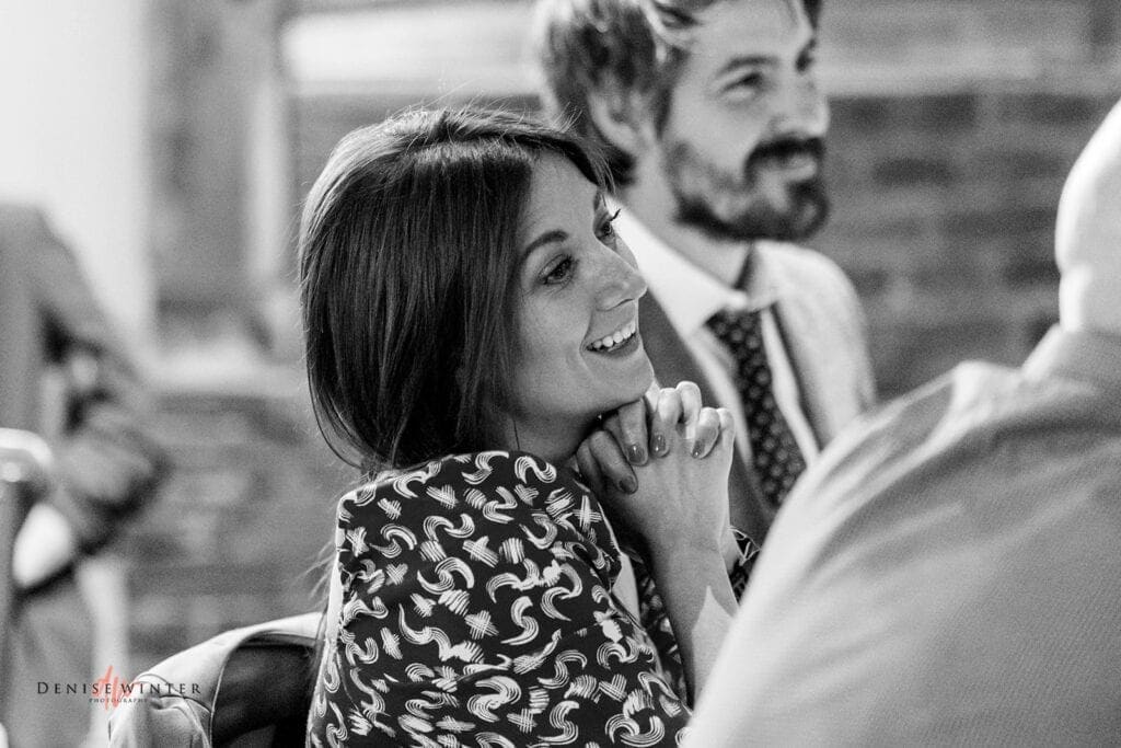 wedding guests laughing at Lillibrooke Manor
