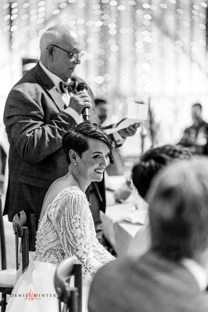 wedding guests laughing at Lillibrooke Manor