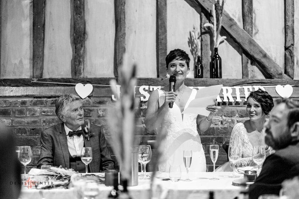 wedding guests laughing at Lillibrooke Manor