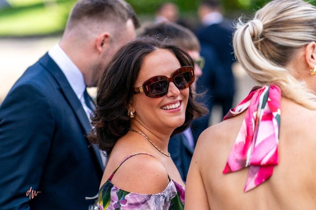 female wedding guests at wasing park wedding