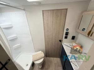 Interior view of a 2026 Acclaim 2500RD RV bathroom and vanity area.