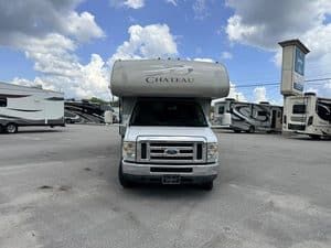 Front view of 2014 Thor Chateau 28Z Class C RV at dealership lot.