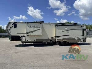Modern Keystone Montana 3931FB fifth wheel RV in excellent condition.