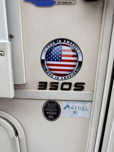 American flag badge on RV with 350S model number.