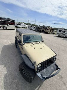 Jeep vehicle in RV dealership lot with multiple RVs in background.
