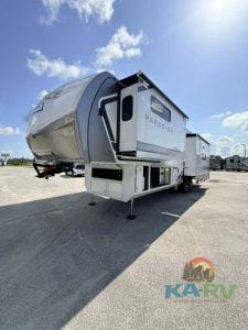 Luxury RV with slide-outs and modern design for travel and camping.