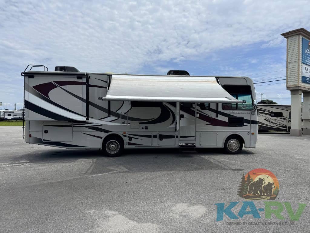 RV with awning extended at KA RV Repair dealership in Optima.
