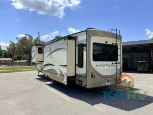 RV trailer with Keystone Montana 3931FB model, ideal for luxury camping and travel.