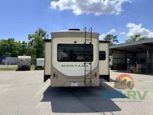 Rear view of 2019 Keystone Montana 3931FB RV at Karv Repair.
