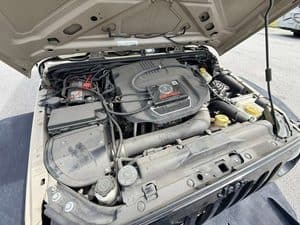 Engine of a 2016 Entegra Cornerstone 45B RV with detailed components.